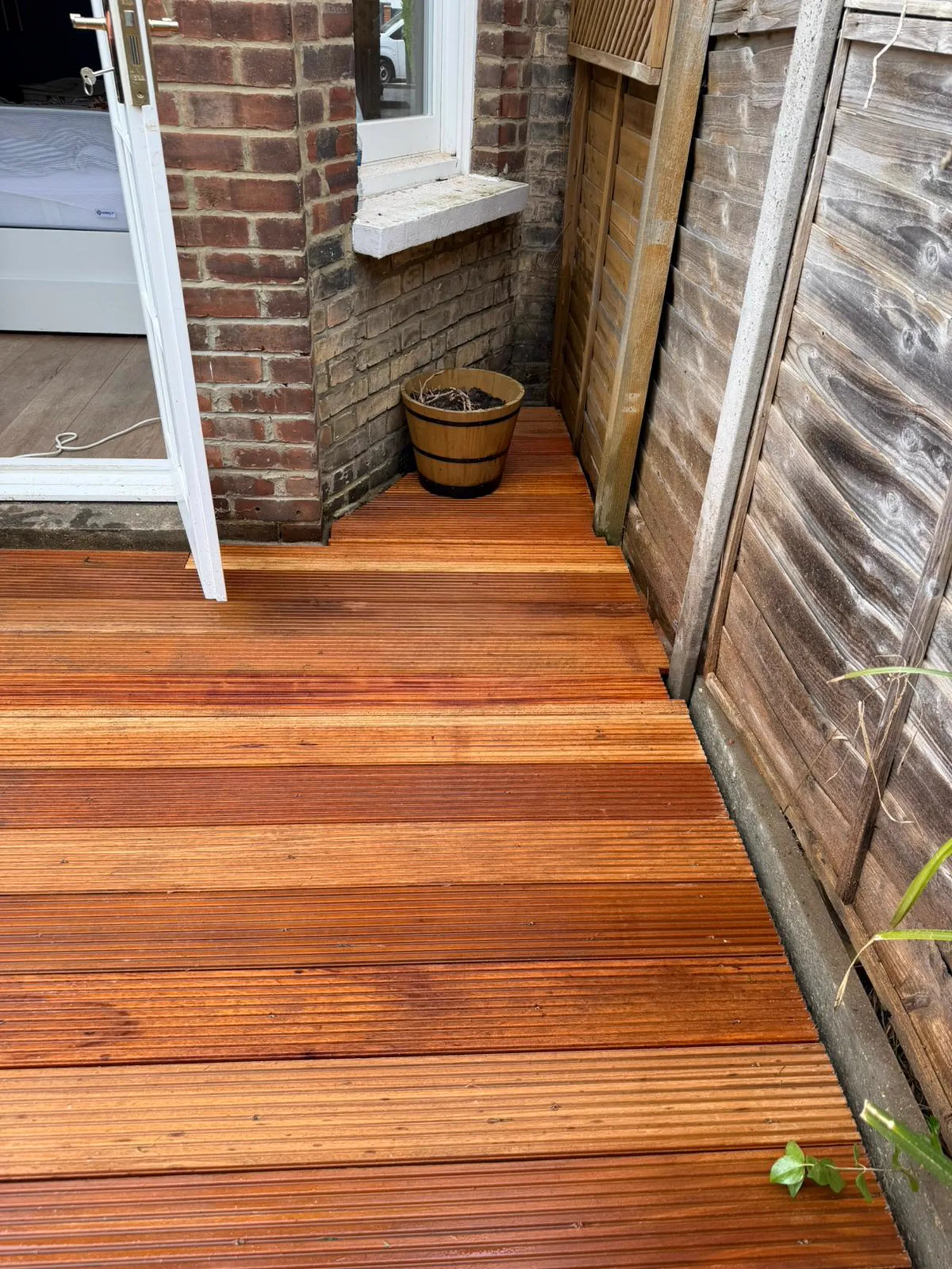 Close-up of Balau hardwood decking boards installed by The Tree Amigos Landscaping in South East London