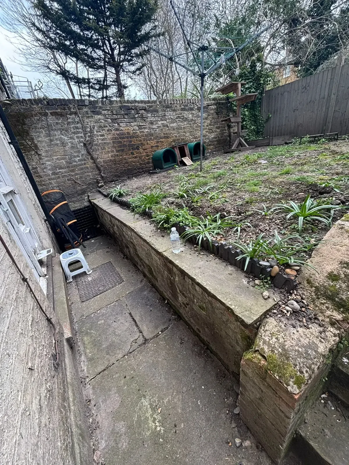 Artificial Turf & Raised Beds before work