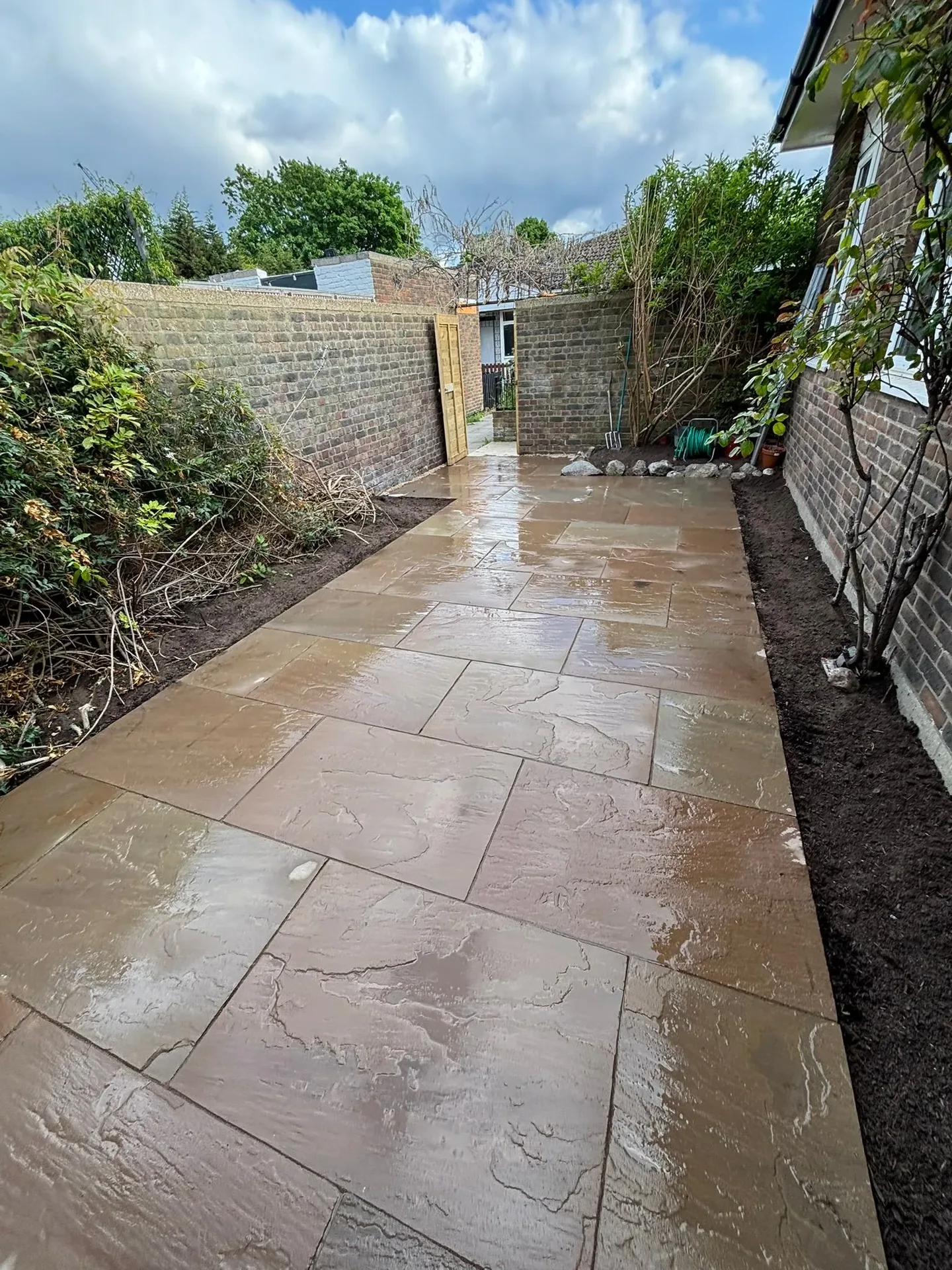 Natural Indian sandstone garden path laid in a South East London garden