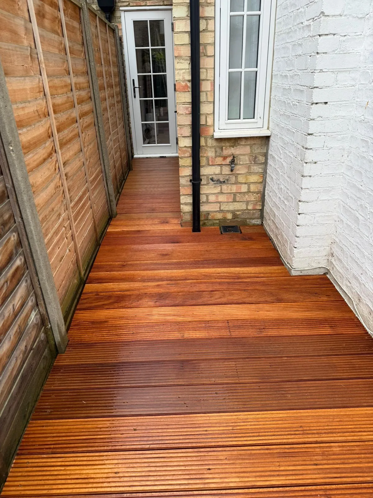 Yellow Balau hardwood timber decking installation in London