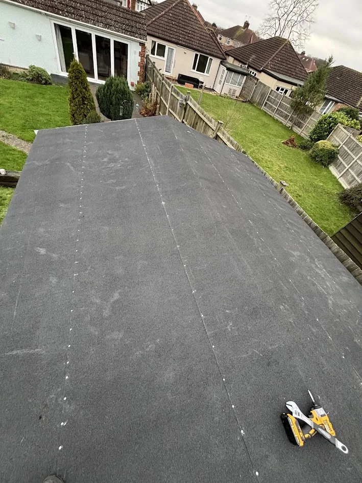 Completed shed roof refelt with new grey mineral felt