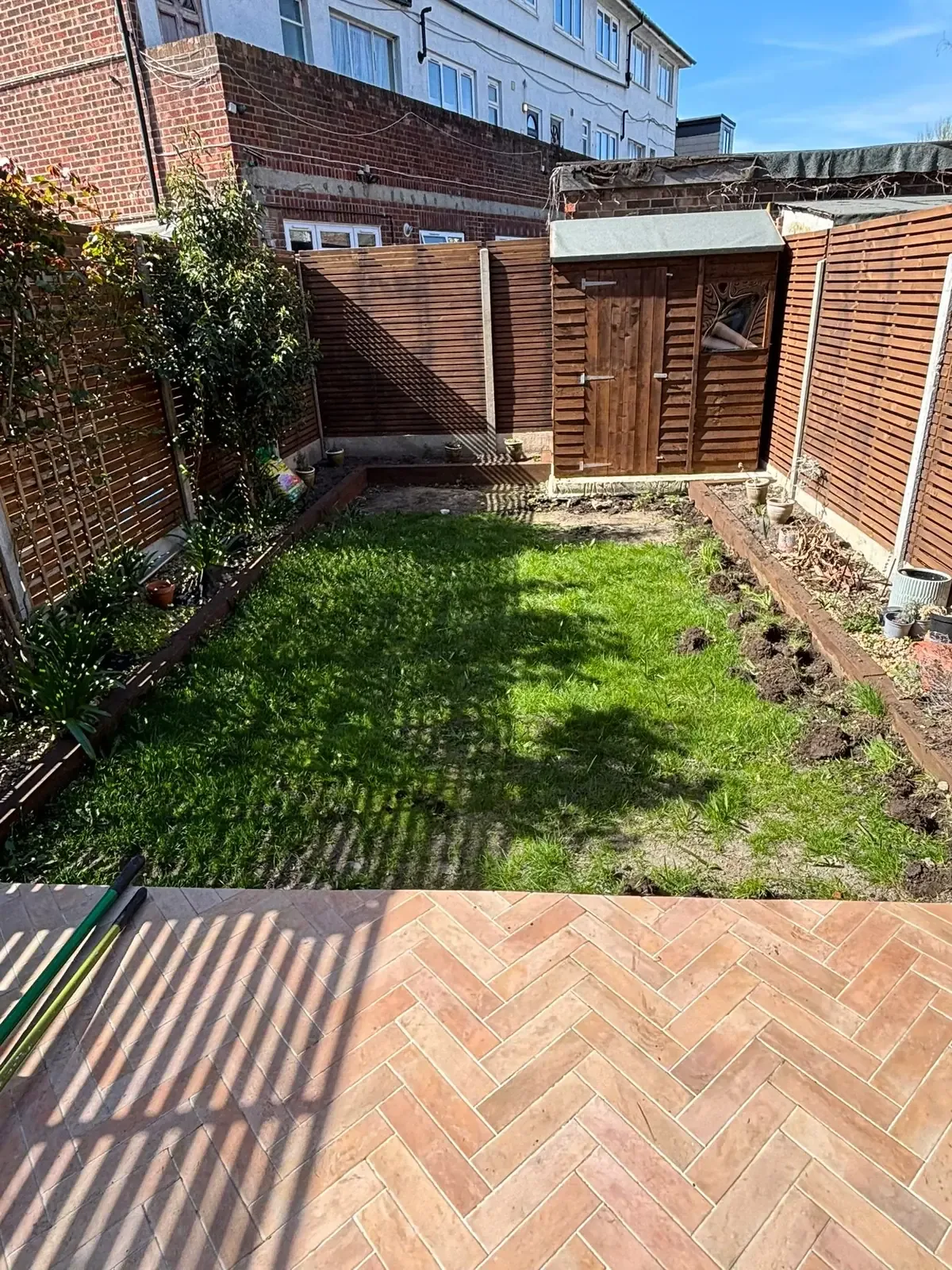 Old patchy and muddy lawn before turfing